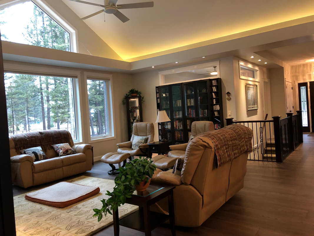 core of the home faces picturesque opening in the trees